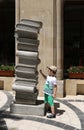Sculptural composition in the form of a stack of books near a bookstore on the Fountain Square in