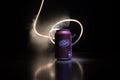 BAKU, AZERBAÃÂ°JAN - SEPTEMBER 15, 2019: Can of Dr Pepper soft drink on dark toned foggy background with light. Dr Pepper is a soft