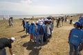 BAKU,AZERBAIJAN- 24 SEPTEMBER 2018 : Group of young students helping one another to clean up the beach, safe ecology