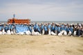 BAKU,AZERBAIJAN- 24 SEPTEMBER 2018 : Group of young students helping one another to clean up the beach, safe ecology