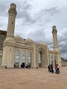 Baku, Azerbaijan, September, 11, 2019. People walking near shiite mosque Bibi-Eibat in autumn in cloudy day. Baku, Azerbaijan Royalty Free Stock Photo