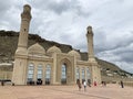 Baku, Azerbaijan, September, 11, 2019. People walking near shiite mosque Bibi-Eibat in autumn in cloudy day. Baku, Azerbaijan Royalty Free Stock Photo