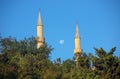 Baku city. Azerbaijan. 09.05.2020 year. The moon is between two minarets Royalty Free Stock Photo