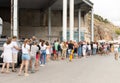 Balaklava, Sevastopol, Crimea - July 8, 2020: Long queue of tourists waiting to enter the historical museum.