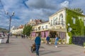 Balaklava, Sevastopol, Crimea - People stroll along the Nazukin embankment. Sunny day. Black sea