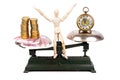 A balance compares the weight of money with the weight of time, job versus leisure time