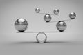 Balance Concept with Chrome Balls on grey background,3d rendering