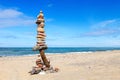 Balance and poise stones. Rock zen on the background of blue sky and sea