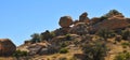 Balance Rock - Desert Terrain Mountain Rocks against a bright Blue Cloudless Sky Royalty Free Stock Photo