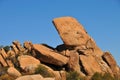 Balance Rock - Desert Terrain Mountain Rocks against a bright Blue Cloudless Sky Royalty Free Stock Photo