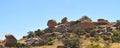 Balance Rock - Desert Terrain Mountain Rocks against a bright Blue Cloudless Sky Royalty Free Stock Photo