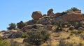 Balance Rock - Desert Terrain Mountain Rocks against a bright Blue Cloudless Sky Royalty Free Stock Photo