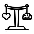 Balance scale comparing weight of heart and brain representing logic versus emotion