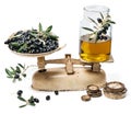 Balance scale fresh of olives and olive oil