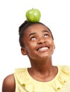 Balance, smile and health with girl and apple in studio for nutrition, wellness and diet. Food, self care and vitamin c