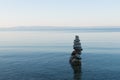 Balance stone pyramid on the sea coast Royalty Free Stock Photo