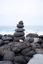 Balance stone tower on sea shore Royalty Free Stock Photo