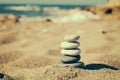 Balance of stones on the beach. Vintage tinting Royalty Free Stock Photo