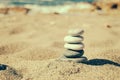 Balance of stones on the beach. Vintage tinting Royalty Free Stock Photo