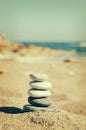 Balance of stones on the beach. Vintage tinting Royalty Free Stock Photo