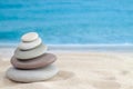 Balance stones pebbles stack pyramid for relaxation meditation with sea or ocean waves on background for horizontal wallpaper Royalty Free Stock Photo