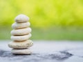 Balance Stones stacked to pyramid in the soft green background Royalty Free Stock Photo