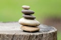 Balance Stones stacked to pyramid in the soft green background. Royalty Free Stock Photo