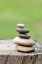 Balance Stones stacked to pyramid in the soft green background. Royalty Free Stock Photo
