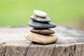 Balance Stones stacked to pyramid in the soft green background. Royalty Free Stock Photo