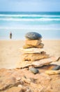 Balance your life concept with woman on the beach Royalty Free Stock Photo