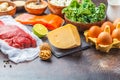 Balanced diet food background. Protein foods: fish, meat, cheese Royalty Free Stock Photo