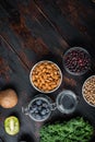 Balanced diet organic healthy food clean eating selection, flat lay on dark wooden background, with space for text