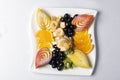 Balanced exotic fruits salad on plate, proper nutrition Royalty Free Stock Photo