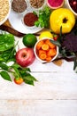 Balanced food background, organic food for healthy nutrition on white wooden backgound. Royalty Free Stock Photo