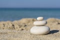 Balanced pebbles on a the beach, close up Royalty Free Stock Photo