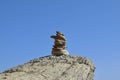 Balanced rock stack against a clear blue sky Royalty Free Stock Photo