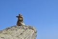 Balanced rock stack against a clear blue sky Royalty Free Stock Photo