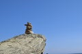 Balanced rock stack against a clear blue sky Royalty Free Stock Photo
