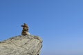 Balanced rock stack against a clear blue sky Royalty Free Stock Photo
