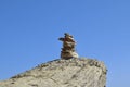 Balanced rock stack against a clear blue sky Royalty Free Stock Photo