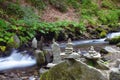 Balanced Rock Zen Stack in front of waterfall. Royalty Free Stock Photo