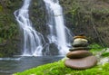 Balanced Rock Zen Stack in front of waterfall. Royalty Free Stock Photo