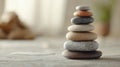 Balanced stack of smooth pebbles representing tranquility and inner harmony Royalty Free Stock Photo