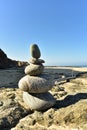 Balanced stack of zen rocks on beach in Baja, Mexico Royalty Free Stock Photo