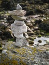 Balance stones on a rock. Blurred background. Concept hard work, goal achievement, insistence, tenacity Royalty Free Stock Photo