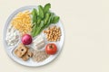 Balanced vegetarian plate with pasta, spinach, chickpeas, and fresh vegetables Royalty Free Stock Photo