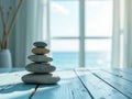 Balanced Zen Stones Stack on Turquoise Table Royalty Free Stock Photo