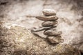 Balancing cairns in the forest Royalty Free Stock Photo