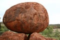 Balancing egg-shaped boulder at Devil's Marbles Royalty Free Stock Photo