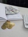 Balancing finances with cryptocurrency and cash Royalty Free Stock Photo